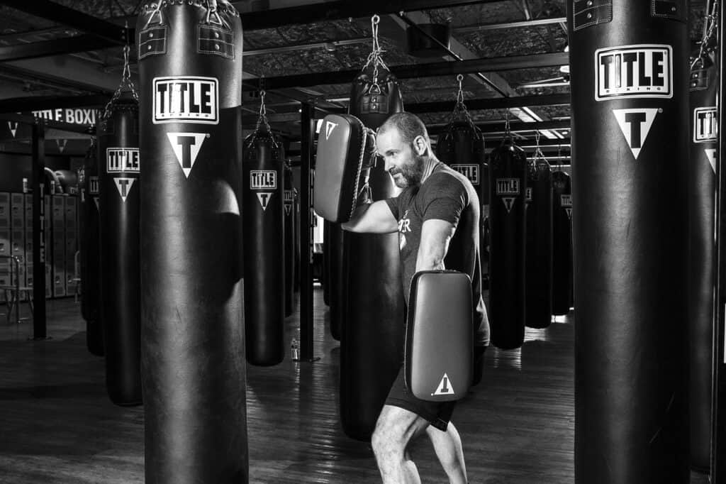 Boxer punching heavy bag